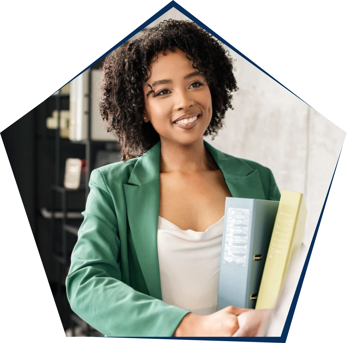 Smiling woman holding office folders